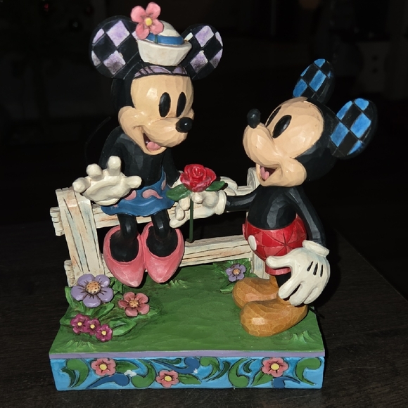 Jim Shore Disney Sculpture with Pink and Red Accents